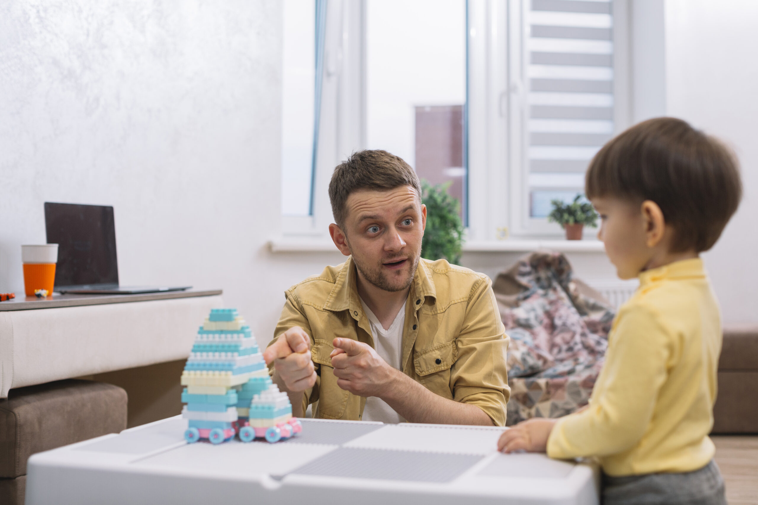 father-showing-his-son-toy